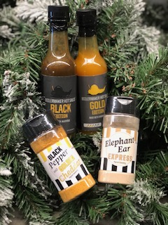 hot sauce and popcorn seasoning in a Christmas tree image